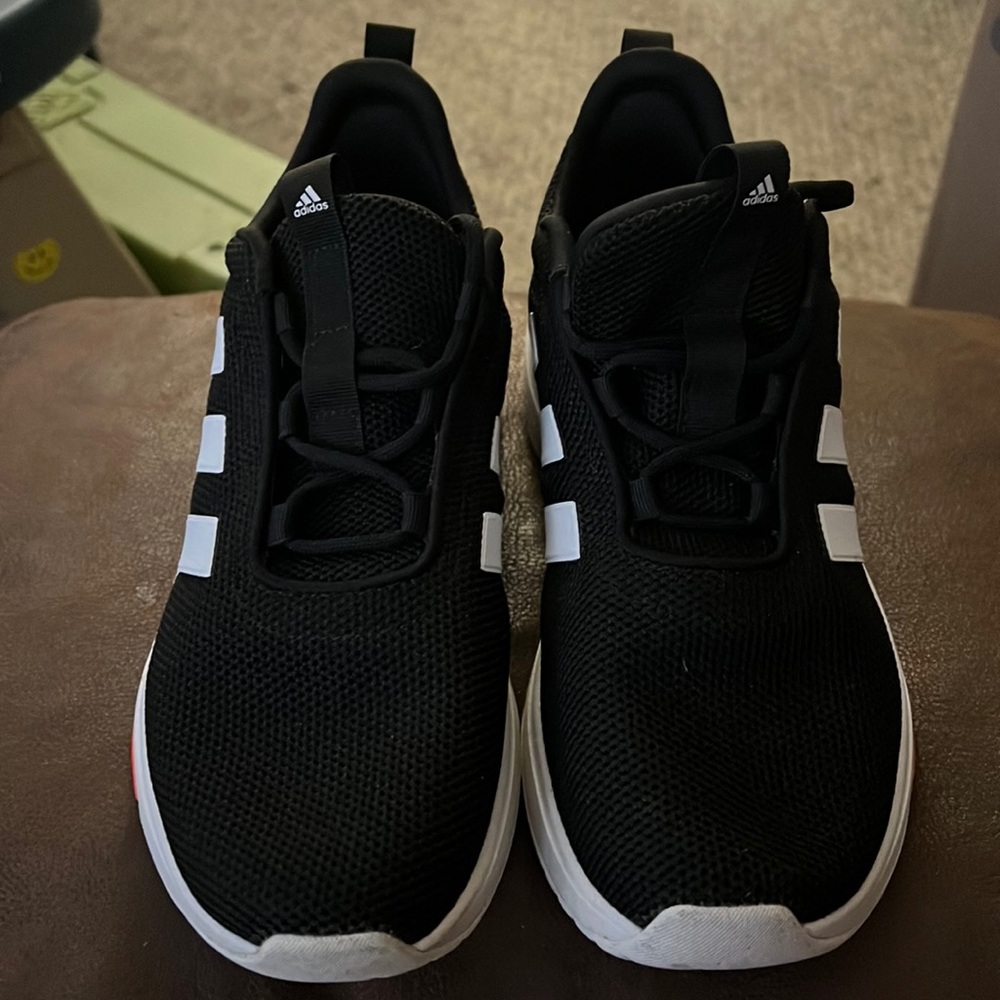Adidas boy or girls size 5. Women size 7